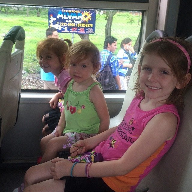 The girls didn't quite know what to make of their first public bus ride! 