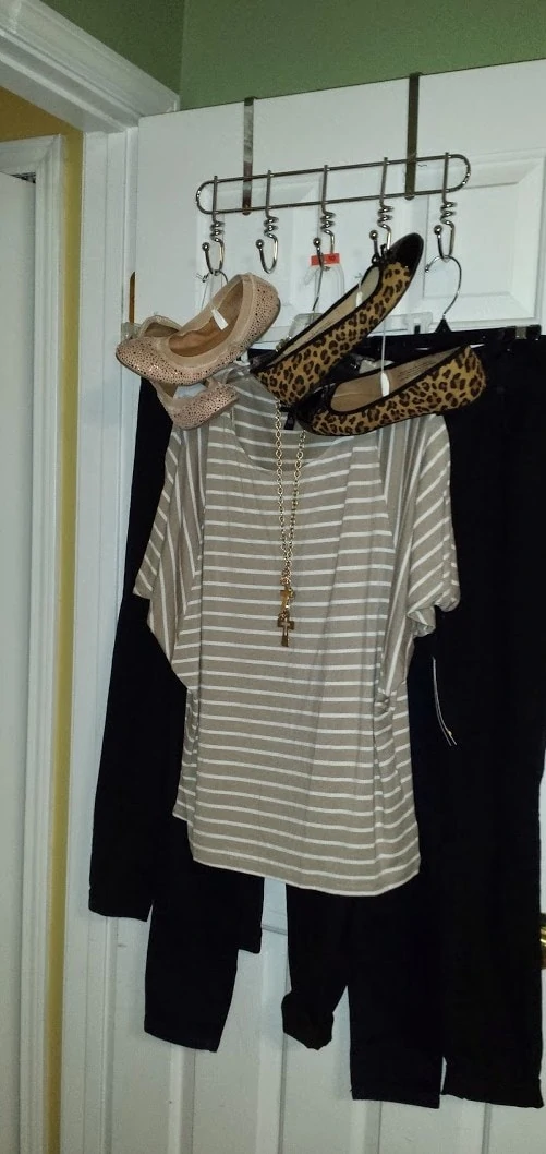 My mom bought me the oversized striped shirt from Kohls. (I LOVE it!) Candace matched it with skinny jeans and flats from Target. My MIL gave me the necklace one Christmas.