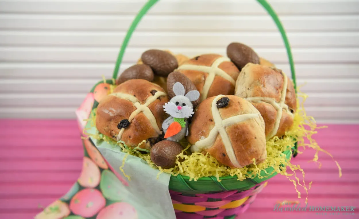 An Easter basket of buns and chocolate eggs.