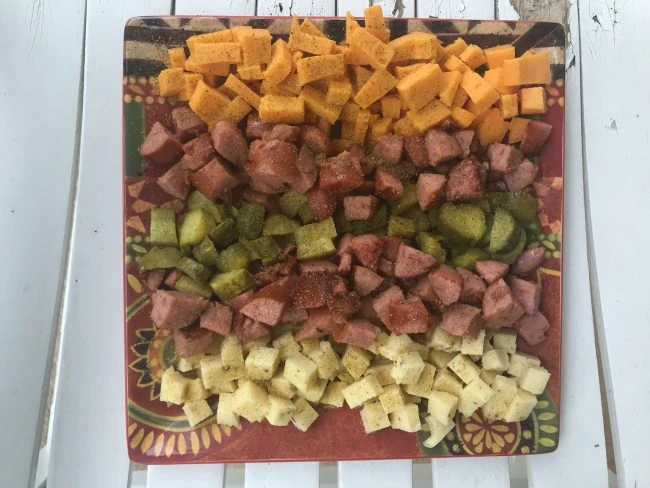 If you're looking for a quick and easy appetizer to take to your next friend or family gathering, then I have the perfect recipe for you! I have partnered with Eckrich Smoked Sausage to bring you a beautiful Smoked Sausage Appetizer Platter. The best part about it was that I was able to incorporate ingredients that I already had in my kitchen, so it was very easy to make. It let me spend less time in the kitchen, and more time spending time with my friends and family, which I think everyone can agree is a great thing!