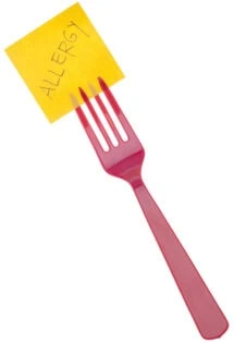 A red fork holds a yellow sticky note with the word "allergy" written in black marker.