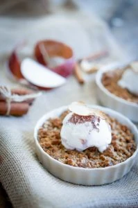 This gluten-free apple crisp will please a crowd--even if the guests aren't gluten-free! It's an easy and delicious gluten-free apple crisp recipe! It would be the perfect alternative to apple pie on Thanksgiving or Christmas or can be enjoyed all year round!