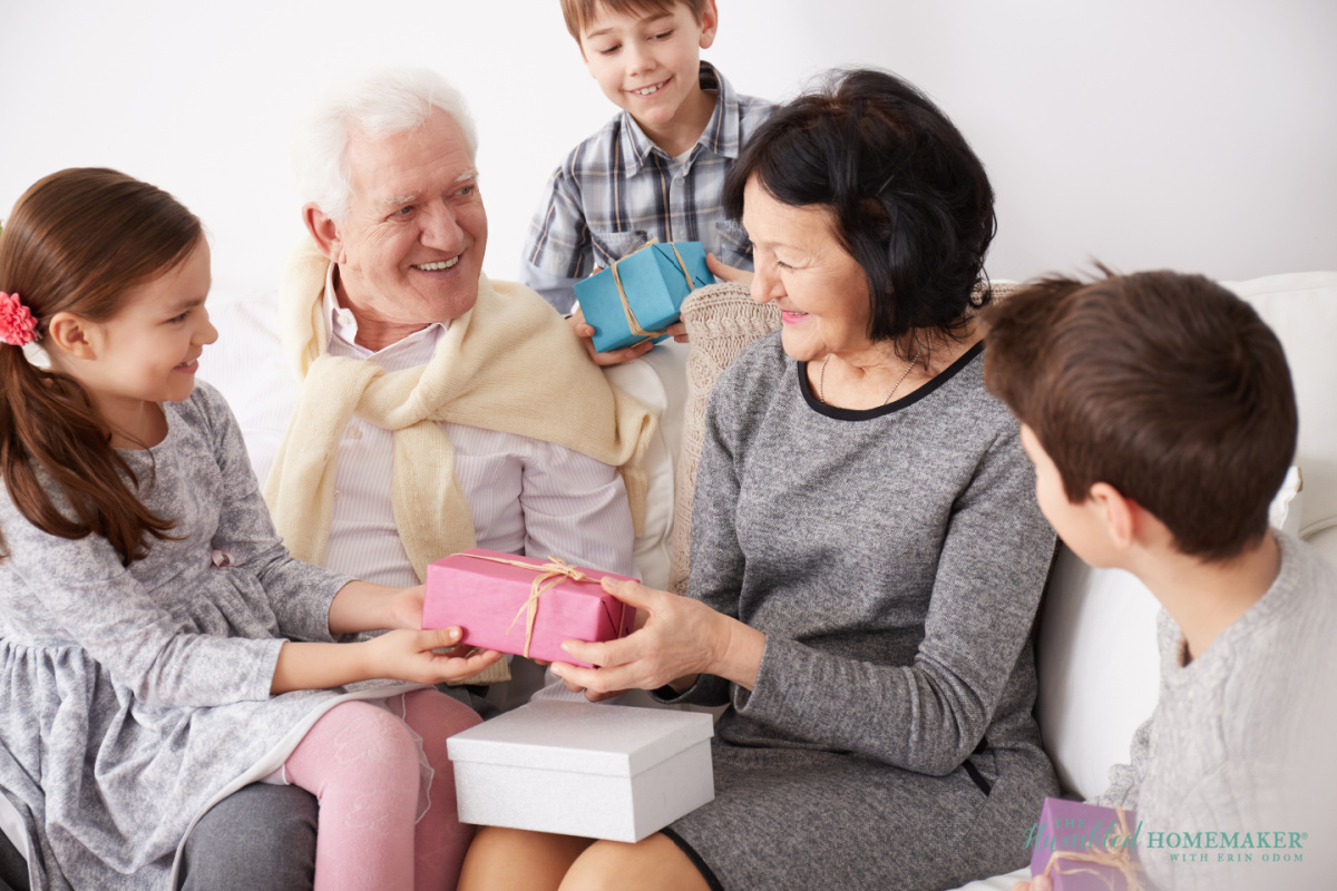 Family of different generations sharing Mother's Day gifts and enjoying each other's company.