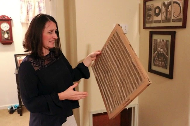 looking at a disgusting, dirty air filter