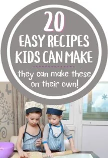 Two little boys, ages preschool and toddler, who are making some kind of food on a cutting board. Both are wearing chefs hats and aprons and are demonstrating easy recipes kids can make own their own.