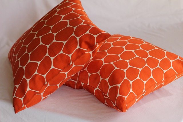 Throw pillows are easy to swap and brighten a room.