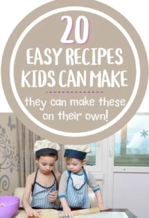 Two little boys, ages preschool and toddler, who are making some kind of food on a cutting board. Both are wearing chefs hats and aprons and are demonstrating easy recipes kids can make own their own.
